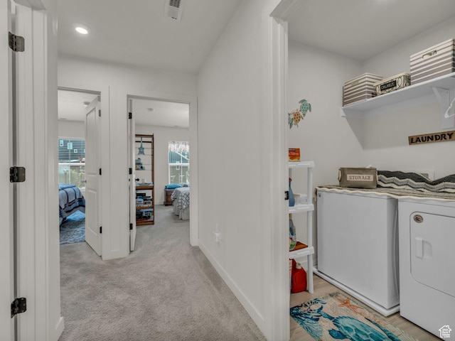 4423 E Longleaf Ln, Eagle Mountain, UT 84005 - laundry area with washing machine and clothes dryer, plenty of natural light, light colored carpet, baseboards, and recessed lighting