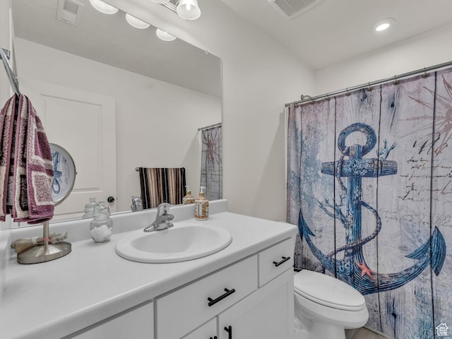 4423 E Longleaf Ln, Eagle Mountain, UT 84005 - bathroom featuring vanity, toilet, curtained shower, and recessed lighting