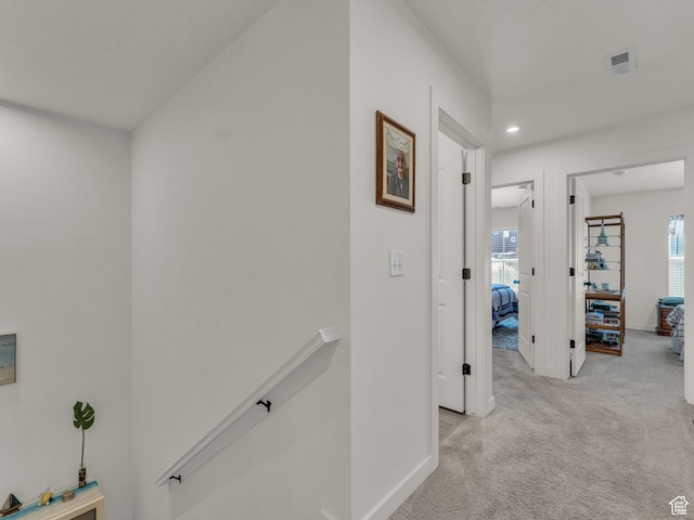 4423 E Longleaf Ln, Eagle Mountain, UT 84005 - corridor featuring an upstairs landing, light carpet, baseboards, healthy amount of natural light, and recessed lighting