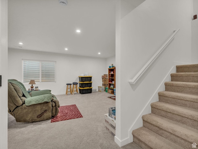 4423 E Longleaf Ln, Eagle Mountain, UT 84005 - living area featuring carpet flooring, stairway, and recessed lighting