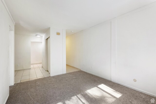 350 E 700 S Unit K102, Salt Lake City, UT 84111 - tiled empty room with carpet floors