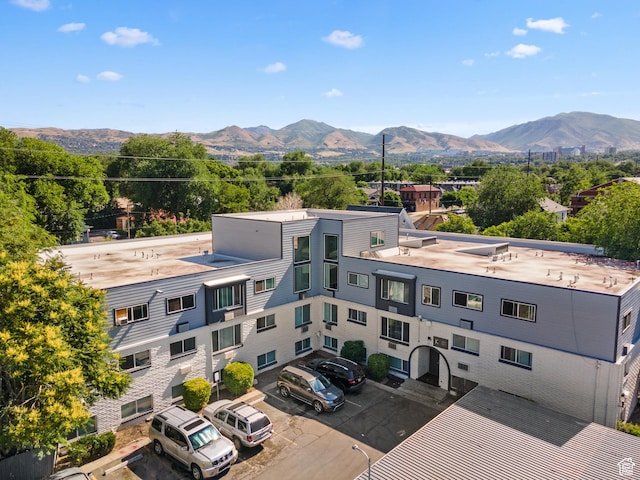 350 E 700 S Unit K102, Salt Lake City, UT 84111 - view of property featuring uncovered parking and a mountain view