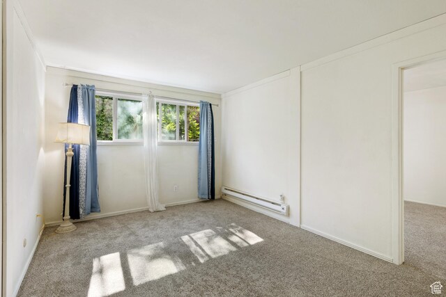 350 E 700 S Unit K102, Salt Lake City, UT 84111 - carpeted spare room with a baseboard radiator