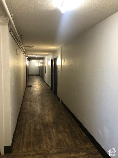 350 E 700 S Unit K102, Salt Lake City, UT 84111 - hall featuring dark wood-style floors and elevator