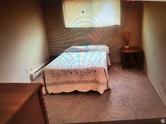 350 E 700 S Unit K102, Salt Lake City, UT 84111 - bedroom with a baseboard heating unit, carpet floors, and wallpapered walls