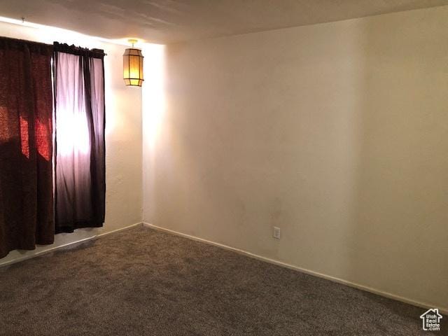 350 E 700 S Unit K102, Salt Lake City, UT 84111 - carpeted empty room featuring baseboards