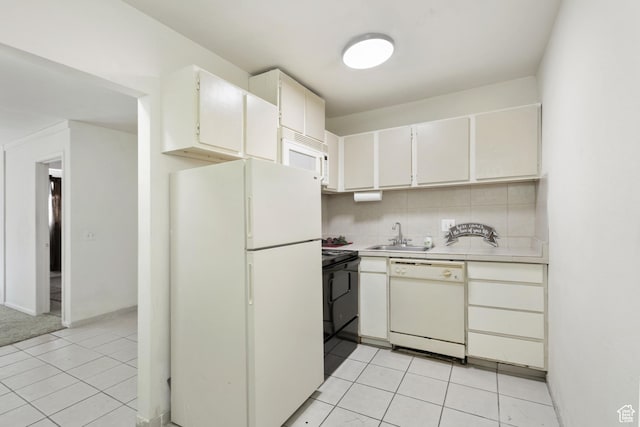 350 E 700 S Unit K102, Salt Lake City, UT 84111 - kitchen with white appliances, a sink, light tile patterned floors, and light countertops