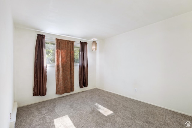 350 E 700 S Unit K102, Salt Lake City, UT 84111 - spare room with carpet flooring and a baseboard heating unit