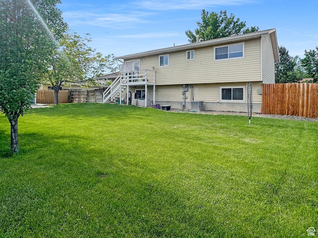 485 W Cottonwood Ln, Ferron, UT 84523 - rear view of house with stairway, central air condition unit, and a wooden deck