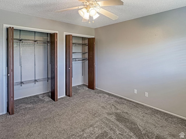 485 W Cottonwood Ln, Ferron, UT 84523 - unfurnished bedroom with carpet, multiple closets, a textured ceiling, baseboards, and ceiling fan
