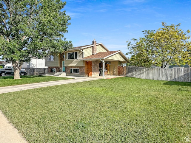 485 W Cottonwood Ln, Ferron, UT 84523 - view of front of property with a chimney, brick siding, and driveway