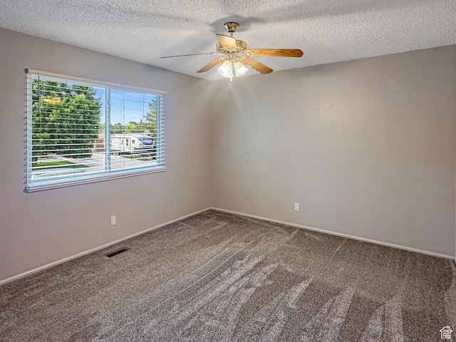 485 W Cottonwood Ln, Ferron, UT 84523 - spare room featuring a ceiling fan, carpet floors, a textured ceiling, and baseboards
