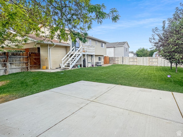 485 W Cottonwood Ln, Ferron, UT 84523 - back of property with stairway and a patio