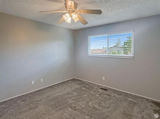 485 W Cottonwood Ln, Ferron, UT 84523 - empty room with carpet floors, ceiling fan, a textured ceiling, and baseboards