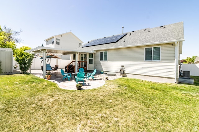 5151 Case Mountain Rd, West Jordan, UT 84081 - rear view of property with a patio area, solar panels, a pergola, and roof with shingles