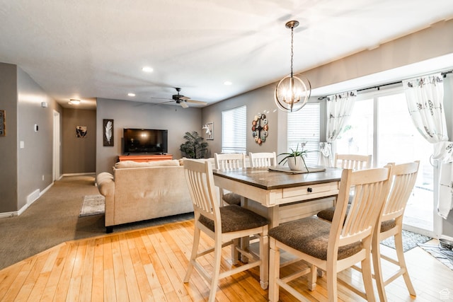 5151 Case Mountain Rd, West Jordan, UT 84081 - dining room with baseboards, ceiling fan, light wood-style flooring, recessed lighting, and a chandelier