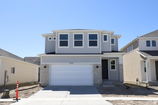 3725 N Janie St Unit 1013, Eagle Mountain, UT 84005 - traditional-style house with driveway, a garage, and stone siding