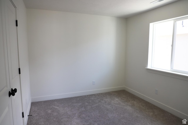 3705 N Janie St Unit 1016, Eagle Mountain, UT 84005 - carpeted spare room with baseboards