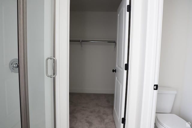 3705 N Janie St Unit 1016, Eagle Mountain, UT 84005 - full bathroom with a stall shower, toilet, and baseboards