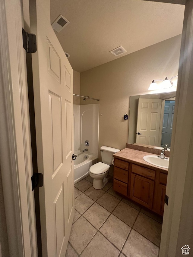 1593 W 110 N Unit 4, Pleasant Grove, UT 84062 - bathroom featuring vanity, tile patterned flooring, shower / washtub combination, and toilet