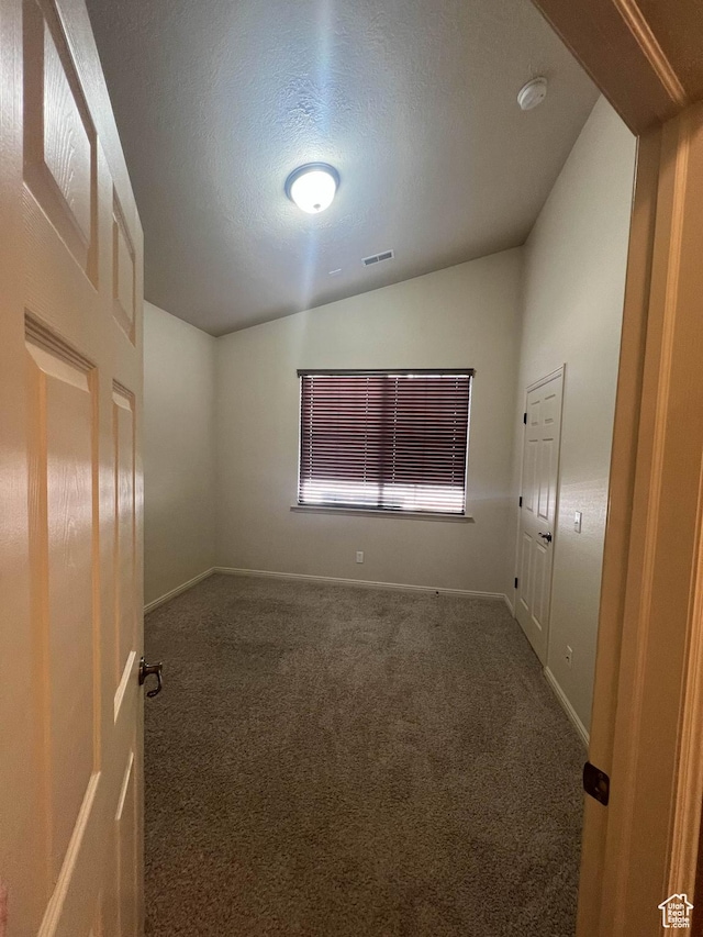 1593 W 110 N Unit 4, Pleasant Grove, UT 84062 - empty room with lofted ceiling, carpet flooring, baseboards, and a smoke detector
