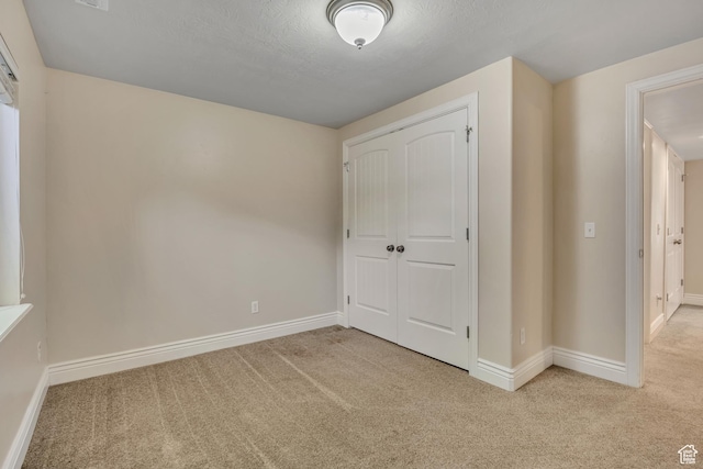 67 E Summer Pl S, Saratoga Springs, UT 84045 - unfurnished bedroom with carpet flooring, baseboards, and a closet