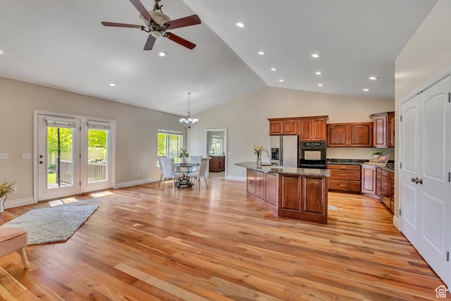 67 E Summer Pl S, Saratoga Springs, UT 84045 - kitchen featuring brown cabinets, light wood-style floors, stainless steel fridge with ice dispenser, a chandelier, and a ceiling fan