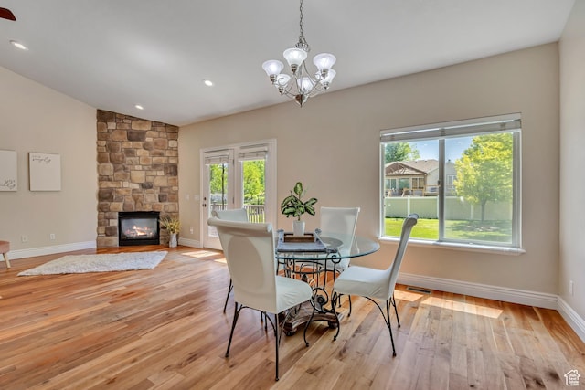 67 E Summer Pl S, Saratoga Springs, UT 84045 - dining area featuring plenty of natural light, light wood-style floors, a chandelier, baseboards, and vaulted ceiling