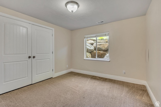 67 E Summer Pl S, Saratoga Springs, UT 84045 - unfurnished bedroom with carpet flooring, baseboards, and a closet