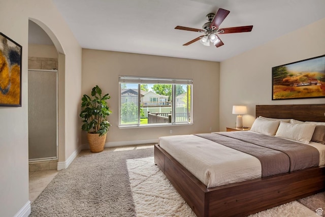 67 E Summer Pl S, Saratoga Springs, UT 84045 - bedroom with arched walkways, baseboards, and a ceiling fan