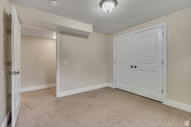 67 E Summer Pl S, Saratoga Springs, UT 84045 - unfurnished bedroom featuring carpet floors, baseboards, and a closet