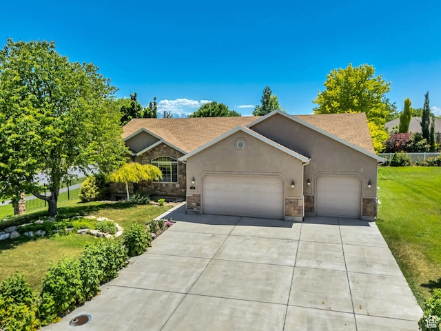 67 E Summer Pl S, Saratoga Springs, UT 84045 - view of front of property with stone siding, a garage, stucco siding, a front yard, and concrete driveway