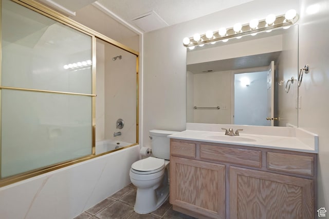 3601 S Truth Ln, Magna, UT 84044 - full bathroom featuring toilet, vanity, enclosed tub / shower combo, and tile patterned floors