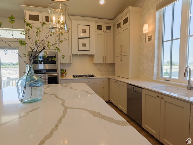 4817 W 50 S, West Point, UT 84015 - kitchen with appliances with stainless steel finishes, a sink, glass insert cabinets, white cabinetry, and recessed lighting