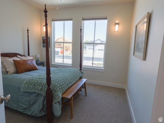 4817 W 50 S, West Point, UT 84015 - carpeted bedroom featuring baseboards