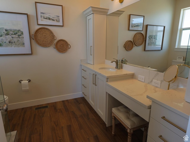 4817 W 50 S, West Point, UT 84015 - bathroom with toilet, wood finished floors, vanity, and baseboards