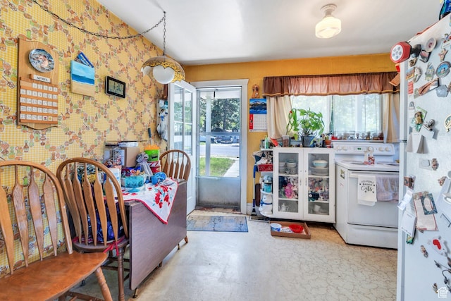 831 E Hillcrest Dr, Springville, UT 84663 - kitchen featuring white appliances, plenty of natural light, and wallpapered walls
