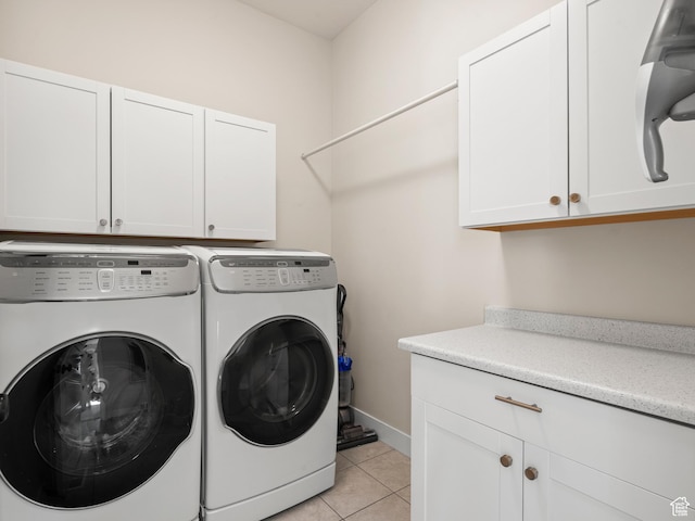 2393 N 300 E Unit 108, Lehi, UT 84043 - washroom with cabinet space, independent washer and dryer, light tile patterned floors, and baseboards