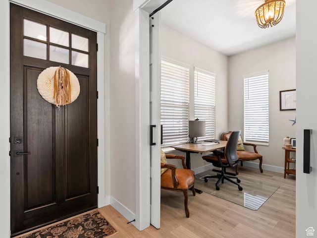 2393 N 300 E Unit 108, Lehi, UT 84043 - foyer featuring light wood-type flooring, baseboards, and a chandelier