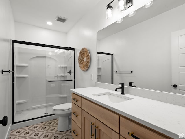 2393 N 300 E Unit 108, Lehi, UT 84043 - full bathroom featuring vanity, a stall shower, toilet, tile patterned floors, and recessed lighting