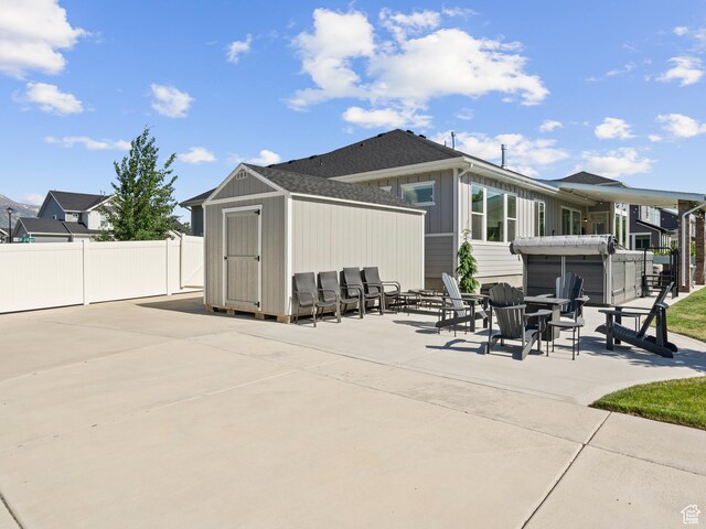 2393 N 300 E Unit 108, Lehi, UT 84043 - rear view of house with a patio and roof with shingles