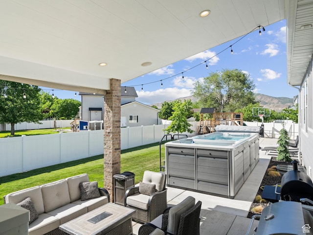 2393 N 300 E Unit 108, Lehi, UT 84043 - view of patio / terrace featuring an outdoor hangout area, a hot tub, a mountain view, and grilling area
