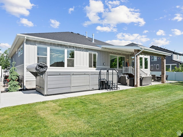 2393 N 300 E Unit 108, Lehi, UT 84043 - back of house with board and batten siding, a patio, an outdoor living space, and roof with shingles