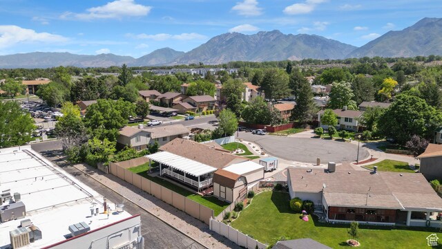 9162 S Pebble Glen Cir, Sandy, UT 84094 - aerial perspective of suburban area featuring a mountainous background
