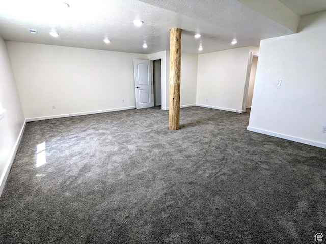 75 N 4th E, Downey, ID 83234 - finished below grade area featuring dark colored carpet and baseboards