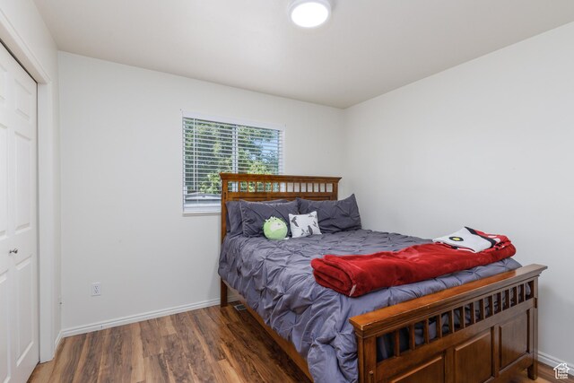 1199 E Pheasant View Dr, Layton, UT 84041 - bedroom with wood finished floors and baseboards