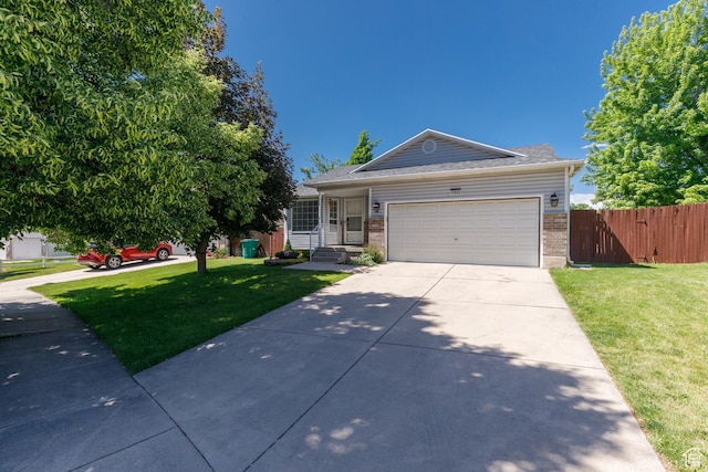 1199 E Pheasant View Dr, Layton, UT 84041 - ranch-style home with brick siding, driveway, and a garage