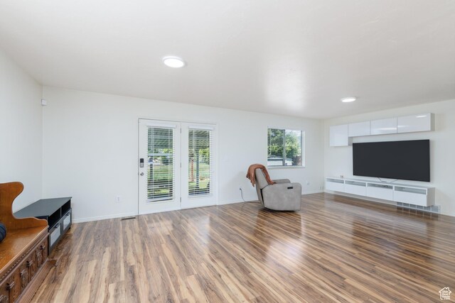 1199 E Pheasant View Dr, Layton, UT 84041 - living area featuring wood finished floors, baseboards, and recessed lighting