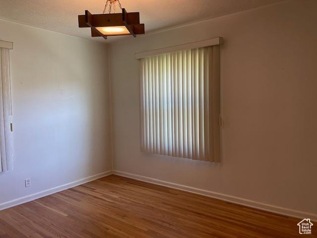 2646 S 1700 E, Salt Lake City, UT 84106 - unfurnished room with wood finished floors and baseboards