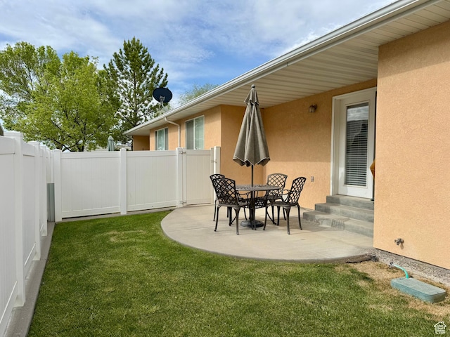 445 Topaz Blvd Unit 10, Delta, UT 84624 - view of yard featuring entry steps and a patio area
